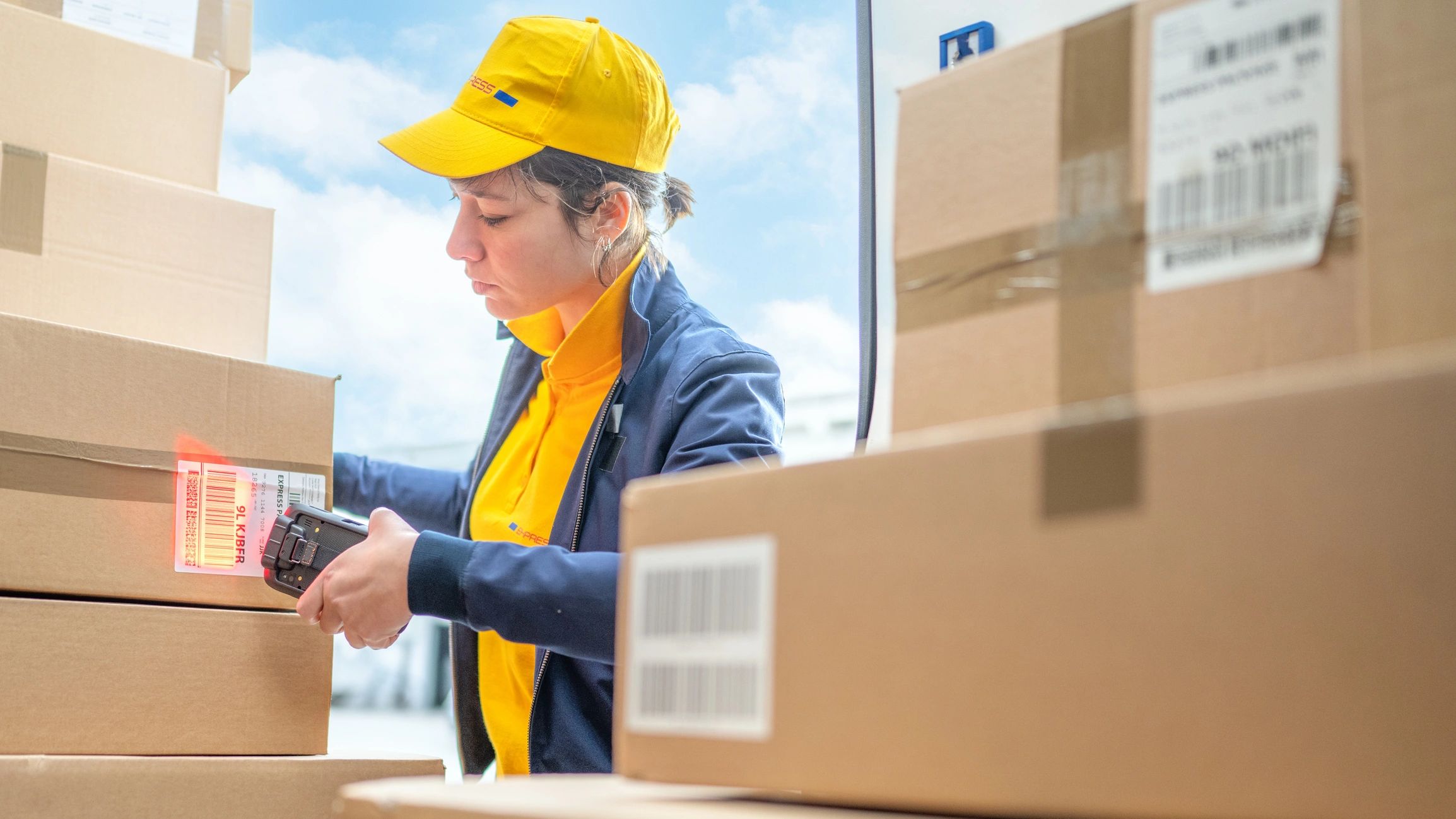 Order package being prepared and scanned for delivery